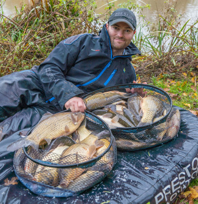 Robbie Griffiths next to fish