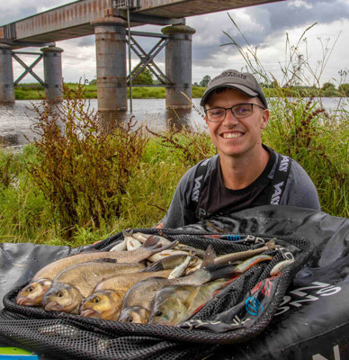 Angler Joe Carass next to fish