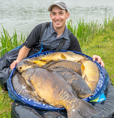 Andy Power next to fish